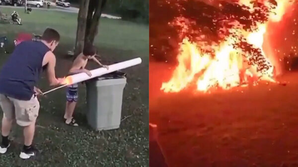 Vreugdevuur met een vuurpijl aansteken zorgt voor zonne grote vuurbal