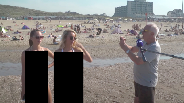 Viespeuk valt bikinimeisjes lastig op de allerlaatste stranddag van het jaar